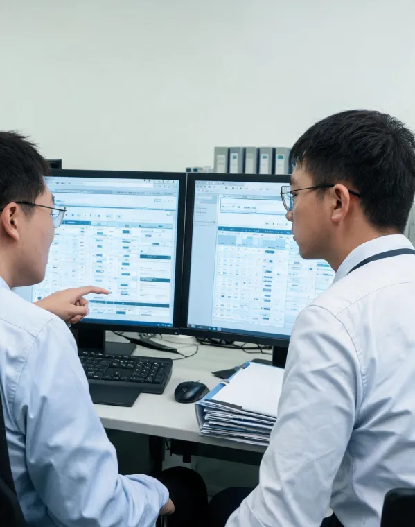 Quality team reviewing device records